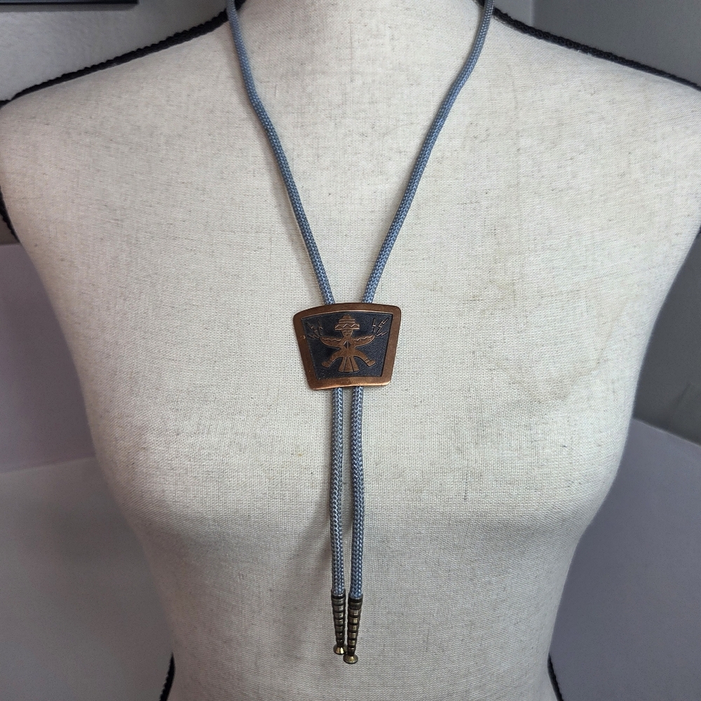vtg bell trading post solid copper native dancer bolo tie grey cloth cord southw